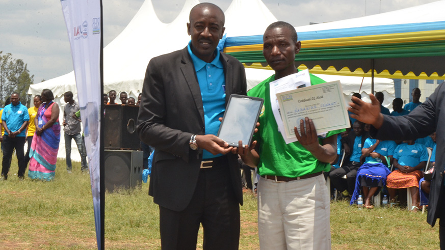 A-tablet-and-a-certificate-for-the-best-teacher-at-district-level.