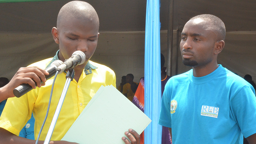 Reading-a-poem-in-the-braille-writing,-a-visually-impaired-student-at-HVP-Gatagara-Rwamagana,-praised-teachers-and-their-role-in-fighting-illiteracy.