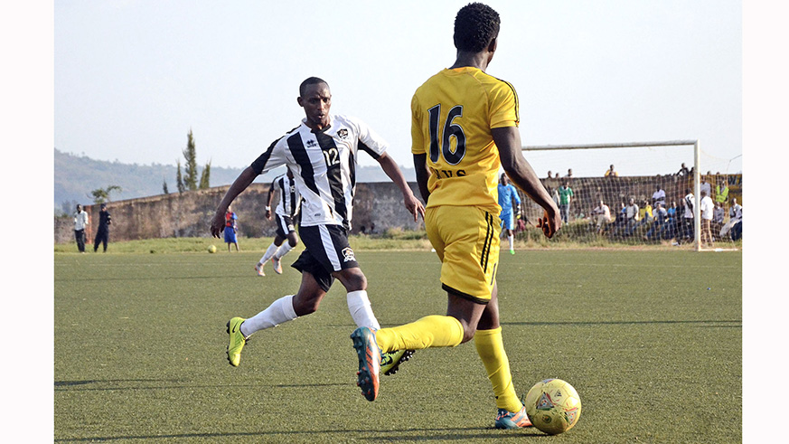 APR FC midfielder Jean Claude Iranzi and Mukura VSu2019 Hussein Habimana in action during the match at Mumena Stadium. Sam Ngendahimana.