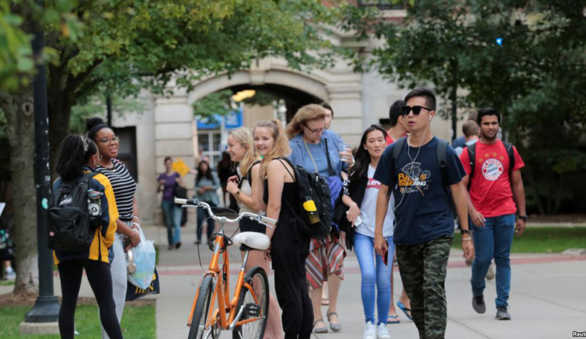 Students walk on campus at the University of Michigan in Ann Arbor, Michigan. Net photo.