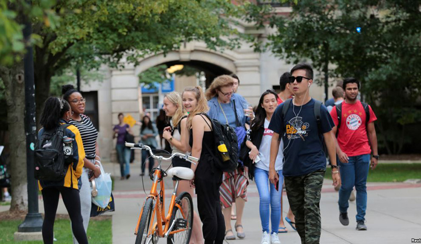 Students walk on campus at the University of Michigan in Ann Arbor, Michigan. Net photo.