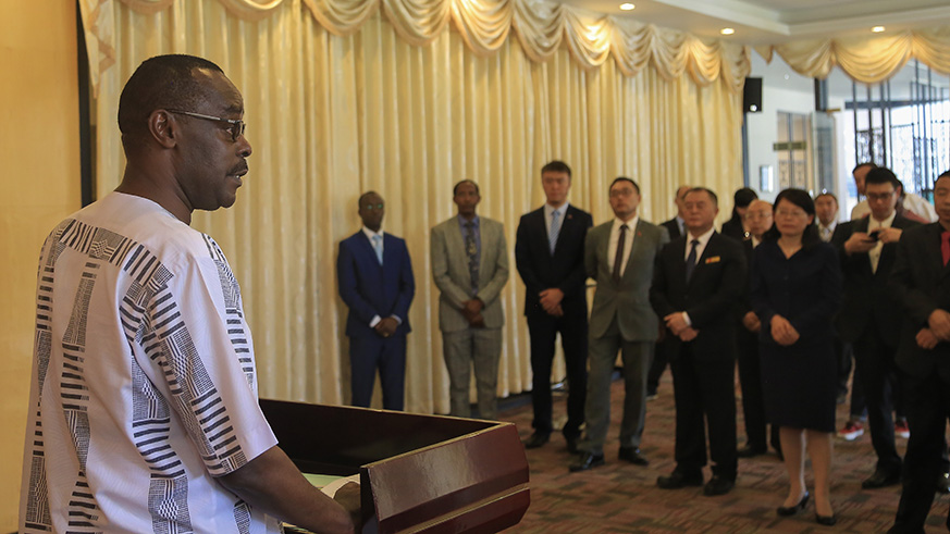 Zuberi Muvunyi, the Director General of Clinical and Public Health Services at the Ministry of Health, addresses the outgoing team during a farewell lunch in Kigali on Friday. Nadege Imbabazi.