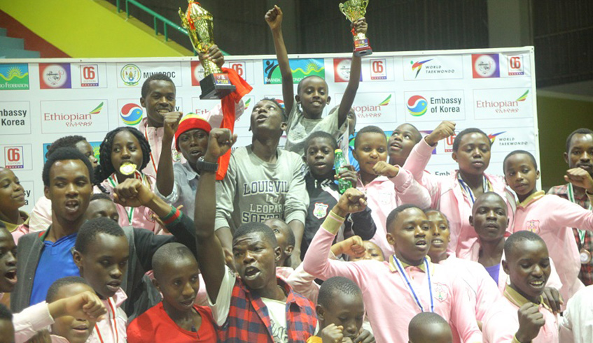 Jubilant Dream Taekwondo Club players and supporters celebrate after dominating the 6th Ambassadoru2019s Cup at Amahoro Indoor Stadium on Sunday. Courtesy.