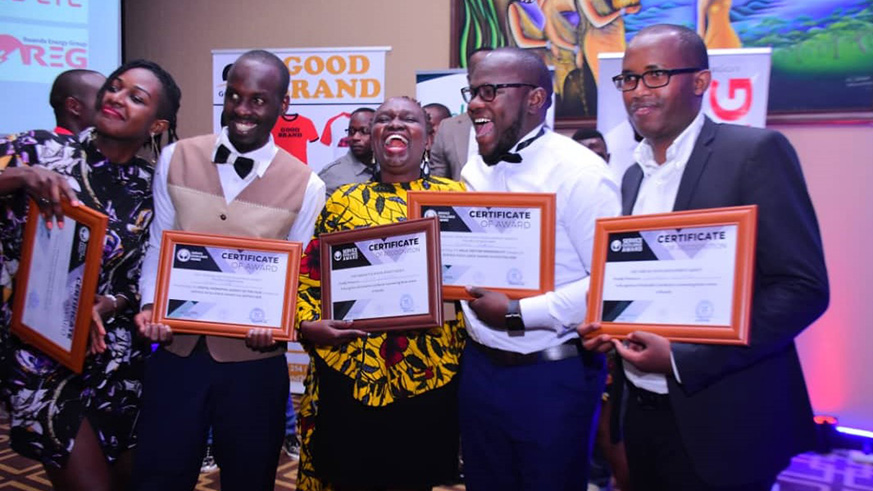 Some of the winners pose for the cameras with their certificates. Courtesy photo. 
