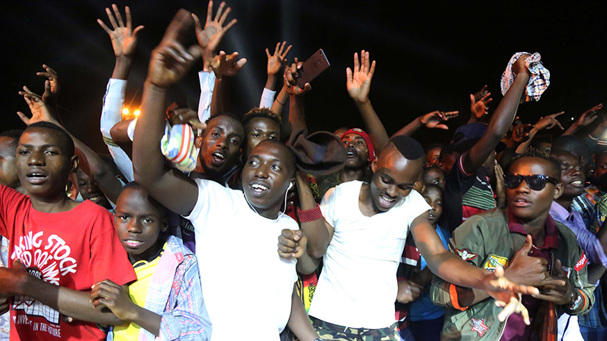 Music lovers dance at a concert in Kigali. Sam Ngendahimana.