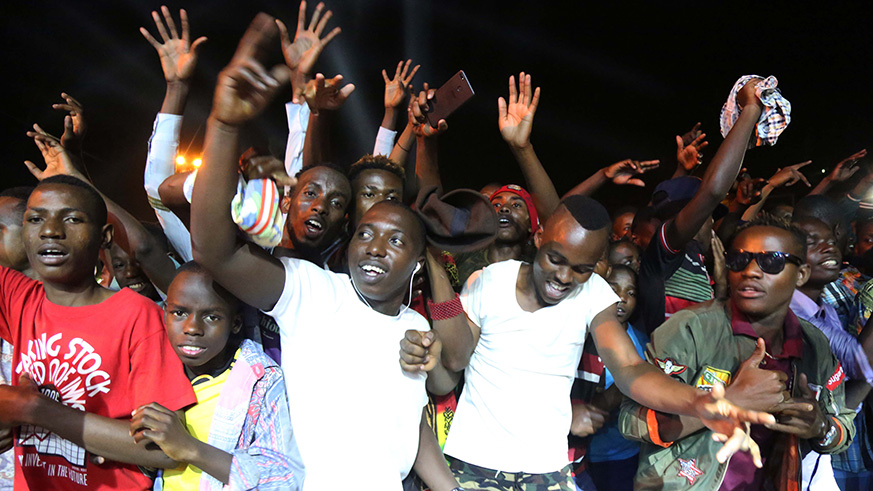 Music lovers dance at a concert in Kigali. Sam Ngendahimana.