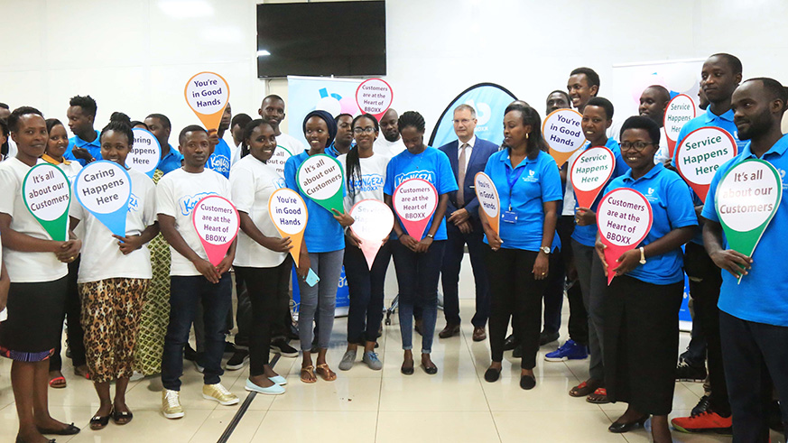 BBOXX Rwanda employees pose for a-group photo to celebrate the Customer Service Week