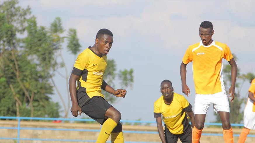 Hussein Ciza (left) in action during Mukurau2019s 3-0 win over second division side Heroes FC in a preseason friendly game at Huye Stadium last month. Courtesy.