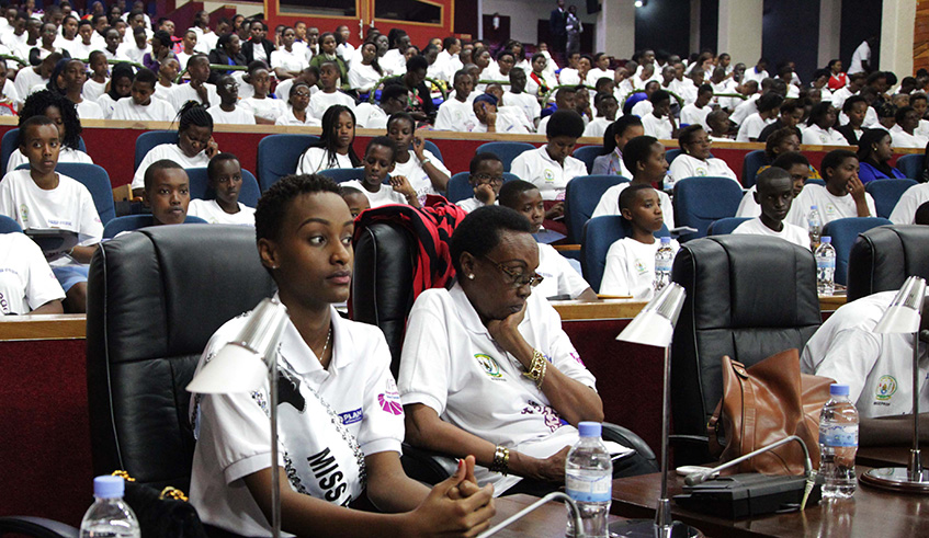 Miss Rwanda 2018 (left, front row) and over 300 hundred teenagers during the official launch of the u2018Girl2Leaderu2019 national campaign in Kigali on Thursday. The Government and its partners pledged a series of initiatives to end teenage pregnancies. Sam Ngendahimana.