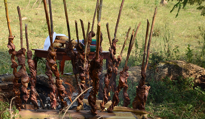 THROUGH OUR LENS-People roast beef in Rwimiyaga sector,Nyagatare during a picnic. Sam Ngendahimana.
