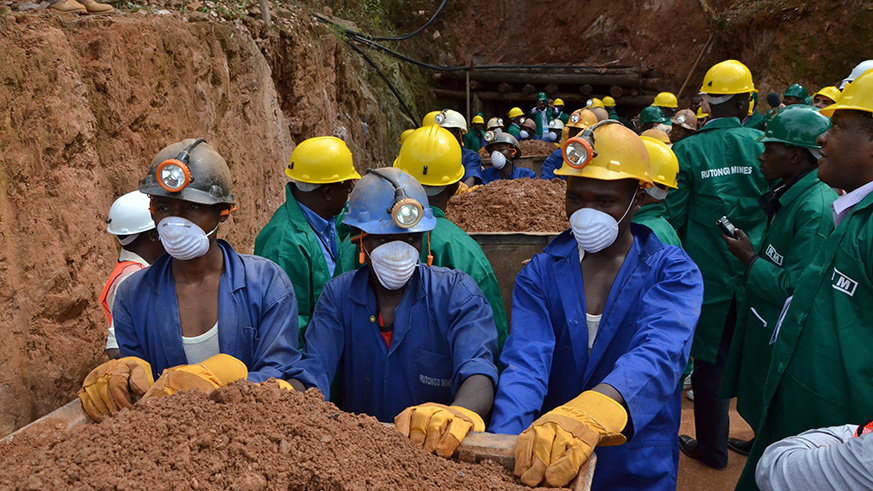 Miners leave a tunnel at Rutongo Mines in Rulindo District. File.