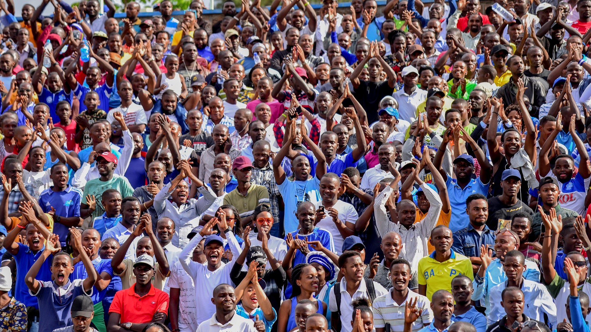 Thousands of Rayon Sports supporters applaud the players after reaching quarter-finals of this year's CAF Confederation Cup at Kigali Stadium in August. File photo