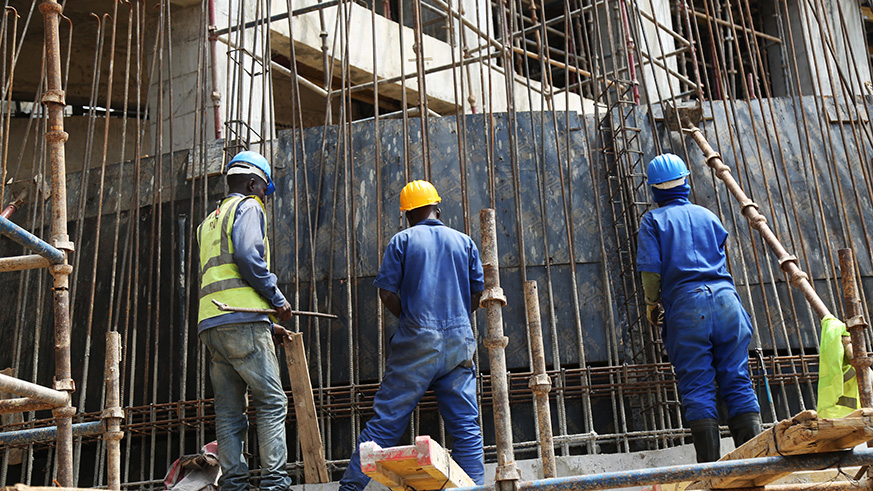 Workers at a construction site in Kigali. Sam Ngendahimana.