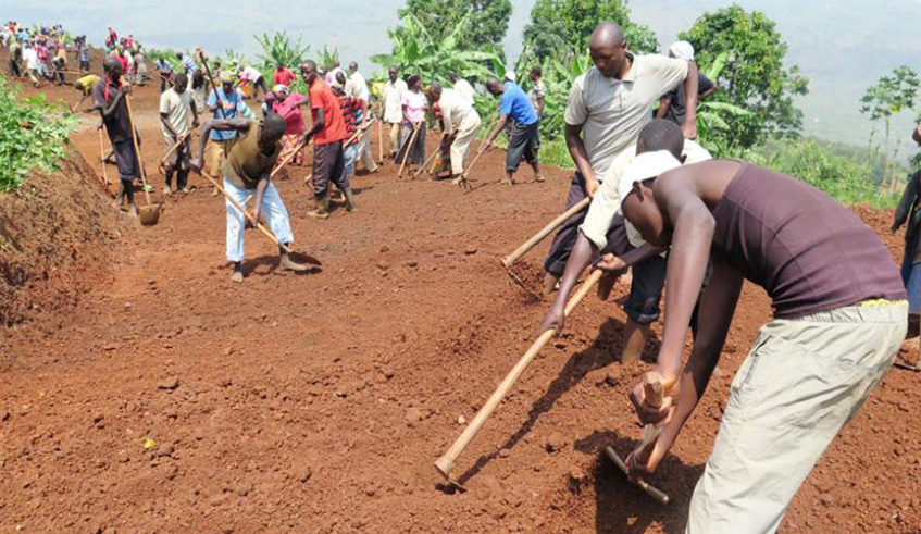 Residents of Rutunga in Gasabo District build a new road under the VUP programme. File.