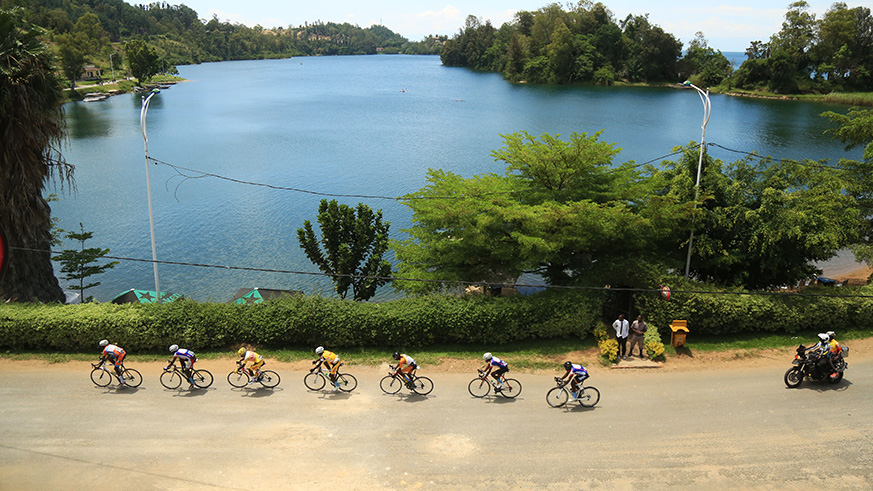 Youngster Moise Mugisha, 21, celebrates his solo victory as he crosses the finish-line in Karongi on Sunday afternoon. Sam Ngendahimana.