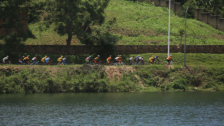 Youngster Moise Mugisha, 21, celebrates his solo victory as he crosses the finish-line in Karongi on Sunday afternoon. Sam Ngendahimana.