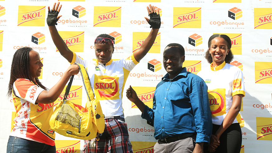 Youngster Moise Mugisha, 21, celebrates his solo victory as he crosses the finish-line in Karongi on Sunday afternoon. Sam Ngendahimana.