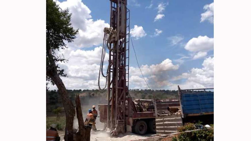 Machines drill up to 120 meters to get to the water. (Photos by Joan Mbabazi)