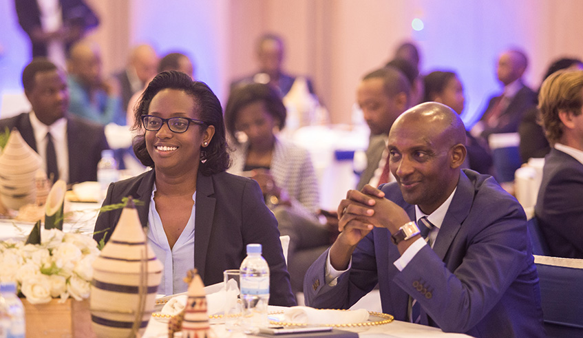 Bank of Kigali CEO, Diane Karusisi (left), and RSSB Director General Richard Tusabe at the launch of the Groupu2019s rights issue on Monday. BK is also set to cross-list share on NSE.  /Nadege Imbabazi.