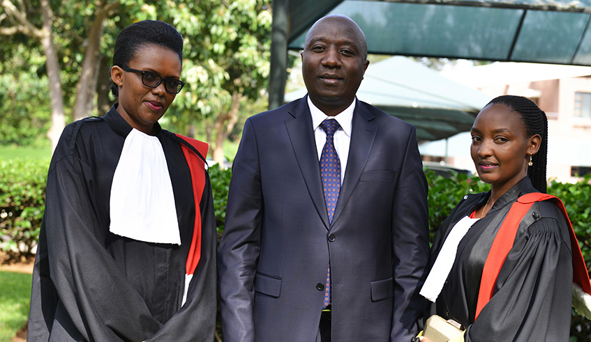 PM Ngirente  poses with prosecutors at the primary level Janviu00e8re Mukarusagara (left) and Clarisse Uwitonze after the swearing-in ceremony yesterday. Courtesy.