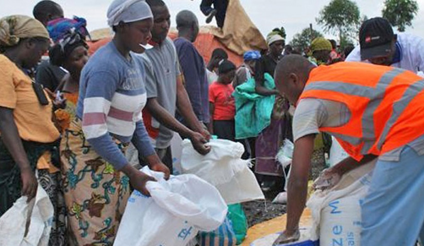 Congolese refugees in Rwanda receiving food supplies. File.
