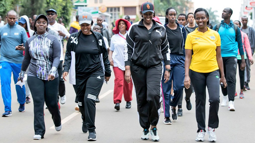 First Lady Jeannette Kagame is joined by, from the left, Dr Diane Gashumba, the Minister for Health; Espu00e9rance  Nyirasafari, the Minister for Sports and Culture; and Marie Chantal Rwakazina, the Mayor of the City of Kigali, during the Car Free Day exercise that took place on Sunday morning. The bi-monthly exercise that brings together hundreds of people, is organised to promote health living among city residents. Courtesy.