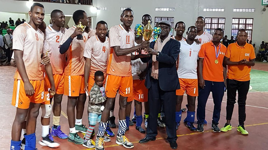 Gisagara players pose with the trophy after winning the pre-season tournament. (Courtesy)