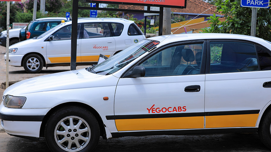 Taxi drivers in Kigali city are considering legal action against the regulatory body, RURA, and Yego Innovation Limited over charges associated with the Intelligent Connected Fare Metres (ICFM) installed in their vehicles.  (Photo by Emmanuel Kwizera)