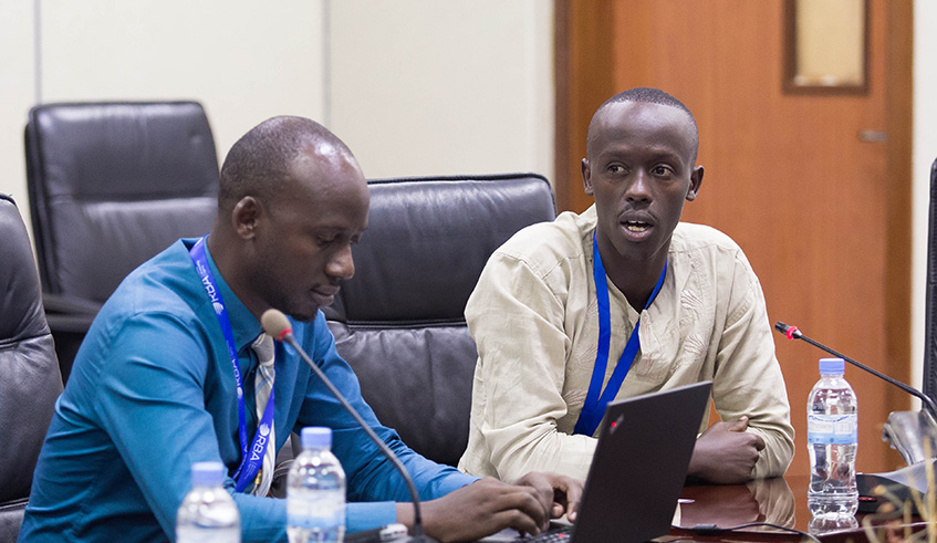 A journalist asks a question during the signing ceremony at Ministry of Finance and Economic planning yesterday. Nadege Imbabazi