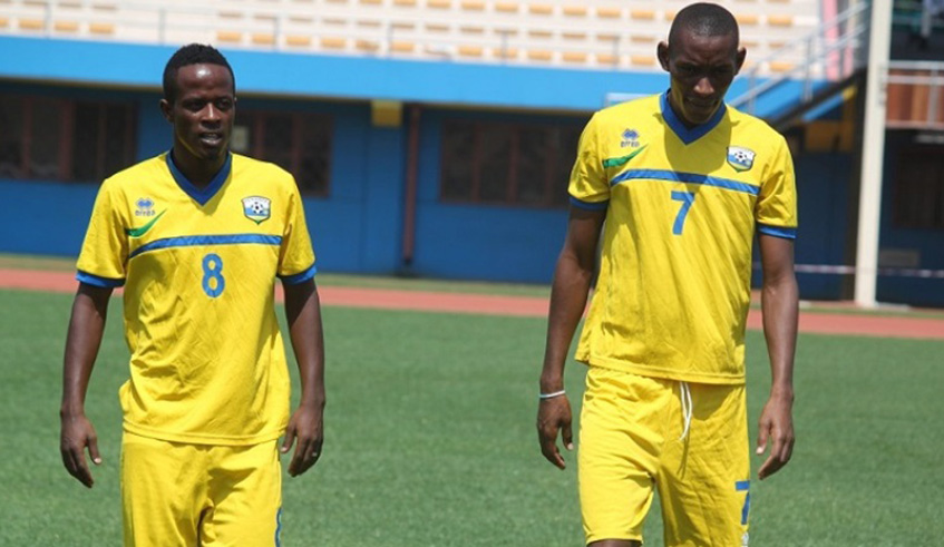 Amavubi captain Haruna Niyonzima (left) and midfielder Jean Baptiste Mugiraneza will not be part of the team to face Central African Republic at Huye Stadium on November 18. File photo.