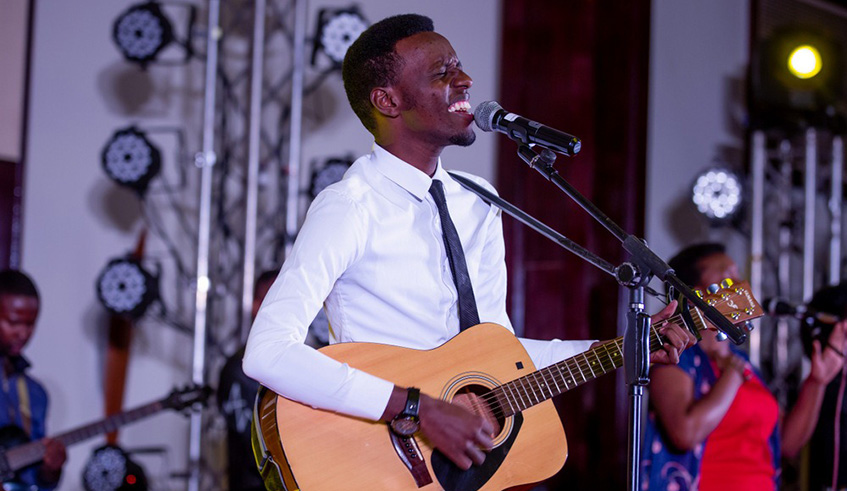 Papy Claver entertains the audience.