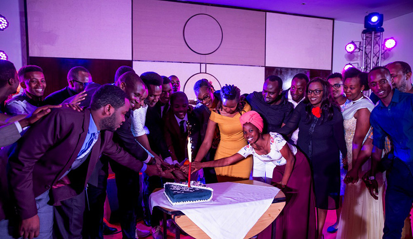 Gospel artistes cutting the cake as Rabagirana worship festival launched in Kigali.