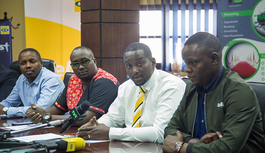 MTNâ€™s Desire Ruhinguka (2nd right) adresses the media. He is flanked by Remmy Lubega of RG Consult (right), Eliud Kagema, also of RG Consult, while far left is Luc Buntu, director of Aflewo.