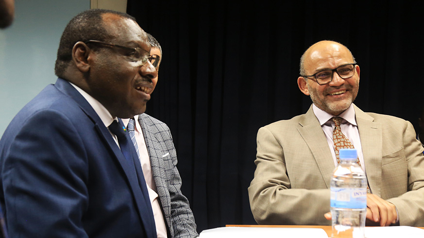 Minister for Infrastructure Claver Gatete (left), and Yasser El- Gammal, the World Bank Group Country Manager, during the presentation of the report in Kigali last month. Sam Ngendahimana.