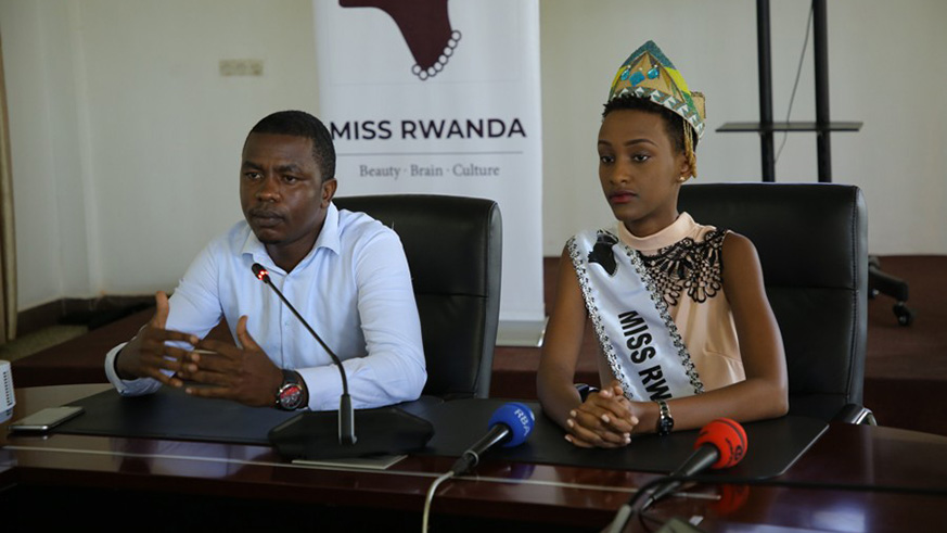 Iradukunda  and Dieudonne Ishimwe address journalists prior to her departure. Courtesy photos