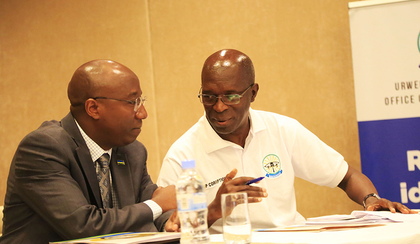 The Chief Ombudsman, Anastase Murekezi chats with Prime Minister Edouard Ngirente, during the meeting. Sam Ngendahimana