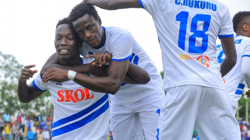 Bonfils Caleb Bimenyimana (eye-closed) is joined by Michael Sarpong in celebrations after netting his second goal against Bugesera FC at Kigali Stadium on Thursday. Courtesy.