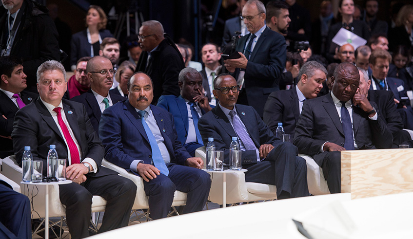 President Kagame and other world leaders at the opening of the three-day Paris Peace Forum yesterday. Village Urugwiro.