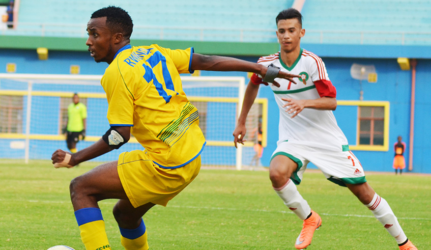 APR winger Dominique Savio Nshuti (left) is the Amavubi U23 captain. He is seen here in action during  a past match against Morocco at Amahoro Stadium. Sam Ngendahimana.