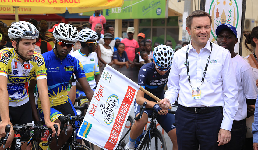 The president of the International Cycling Union (UCI), David Lappartient, is seen here officially flaging off the 2018 Tour du Rwanda on August 5 in Rwamagana. It was his first visit to Rwanda Sam Ngendahimana.