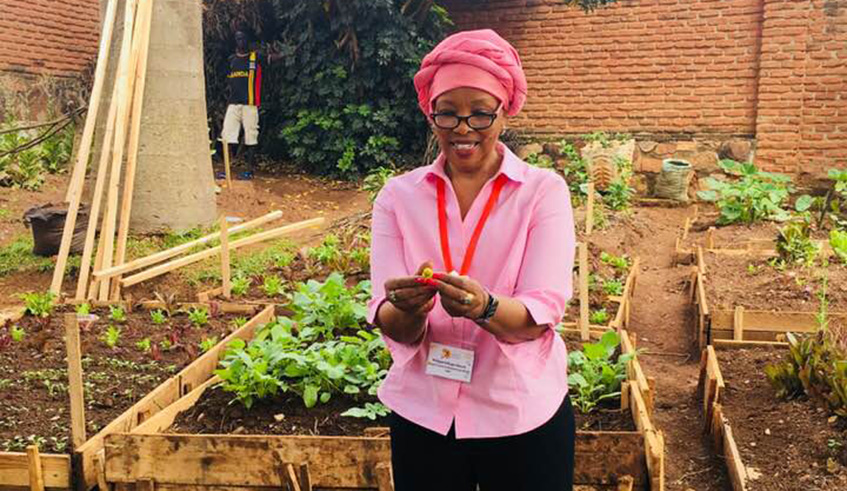 Kibugu showing visitors around the wellness centre. 