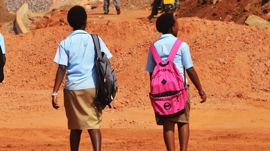 Young ladies captured here from school in Kigali. ICFP Youth Leaders and family planning experts illustrated the barriers young people face while trying to prevent unintended pregnancies.Sam Ngendahimana