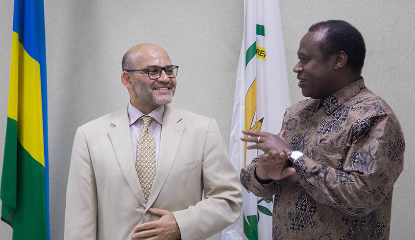 Minister of Finance Uzziel Ndagijimana and World Bank Group the Country Manager Yasser El- Gammal chats after signing US$125million Development Policy Operation credit agreement to support a fiscally sustainable expansion of electricity services in Rwanda. Nadege Imbabazi.