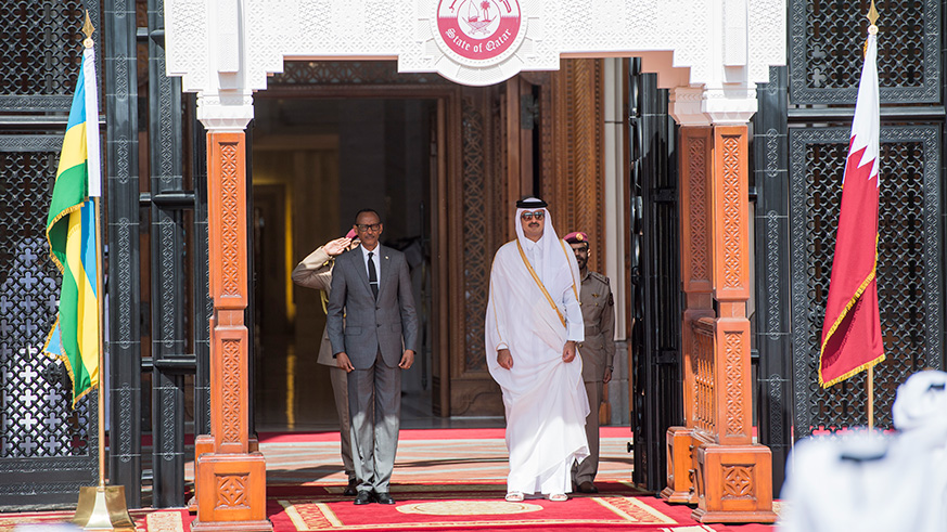 Sheikh Tamim bin Hamad Al Thani, the Emir of Qatar (right), welcomes President Kagame to the Amiri Diwan Office where they held bilateral talks on furthering areas of economic cooperation between the two nations in Doha yesterday.  Village Urugwiro.
