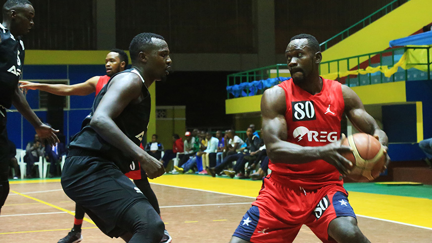 REG centre Bienvenu Ngandu (with the ball) has proved to be back to his best form after suffering a series of injuries that kept him off the court last season. Sam Ngendahimana.