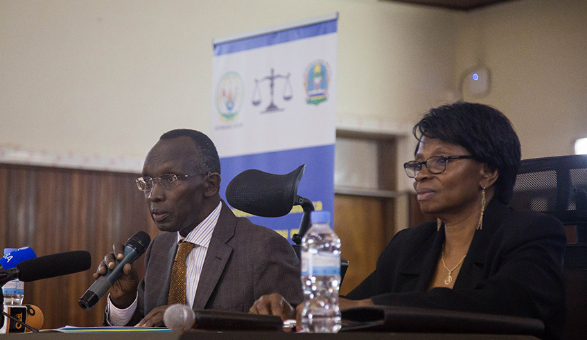 Chief Justice Sam Rugege addresses a news conference ahead of the 2018 Judicial Week, as Deputy Prosecutor General Agnes Mukagashugi looks on at the Supreme Court in Kimihurura yesterday. Rugege said the number seeking divorce is increasing every year. Nadege Imbabazi