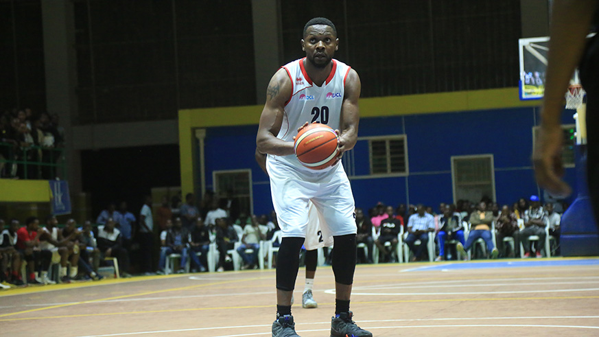 REG centre Kami Kabange takes a free throw during the third quarter in the 88-59 victory over Patriots at Amahoro Indoor Stadium on Friday night. Sam Ngendahimana.