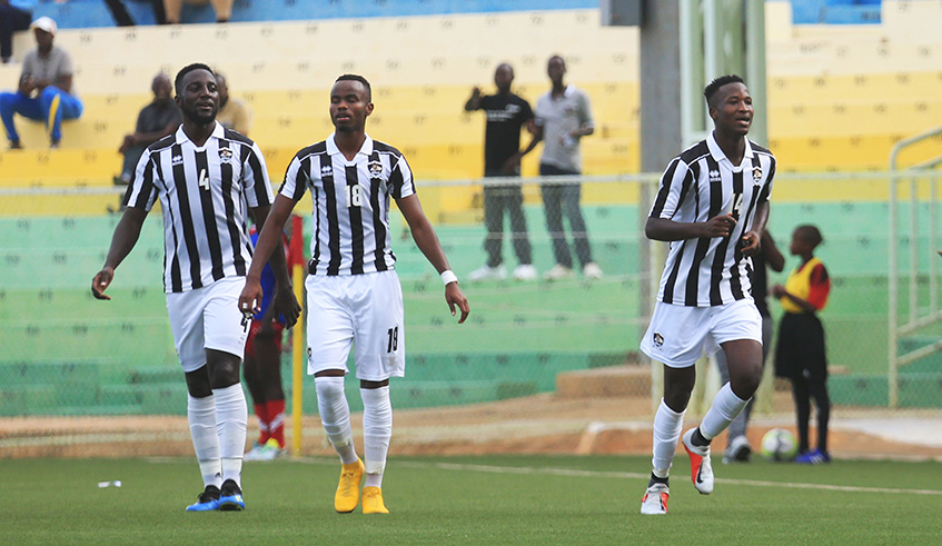 APR FCu2019s defenders Herve Rugwiro, and Prince Buregeya and forward Lague Byiringiro celebrate a goal during a league match against Kirehe FC at Kigali Stadium. Sam Ngendahimana.