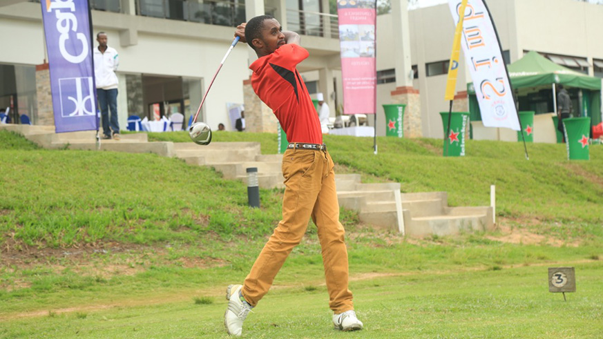 Ernest Ndayisenga plays his tee off shot during Round 3 on the 3rd hole at Kigali Golf Course on Friday. Sam Ngendahimana.