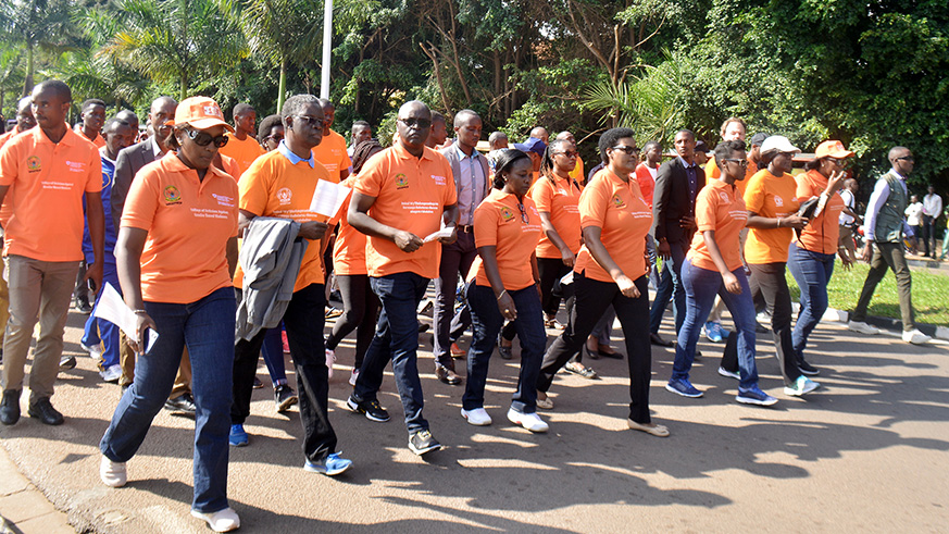 Officials and residents of Kigali during the launch of the 16 Days of Activism to fight Against Gender-Based Violence in Kigali.Yesterdayu2019s walk started from Parliament to Amahoro stadium where discussions took place. Frederic Byumvuhore